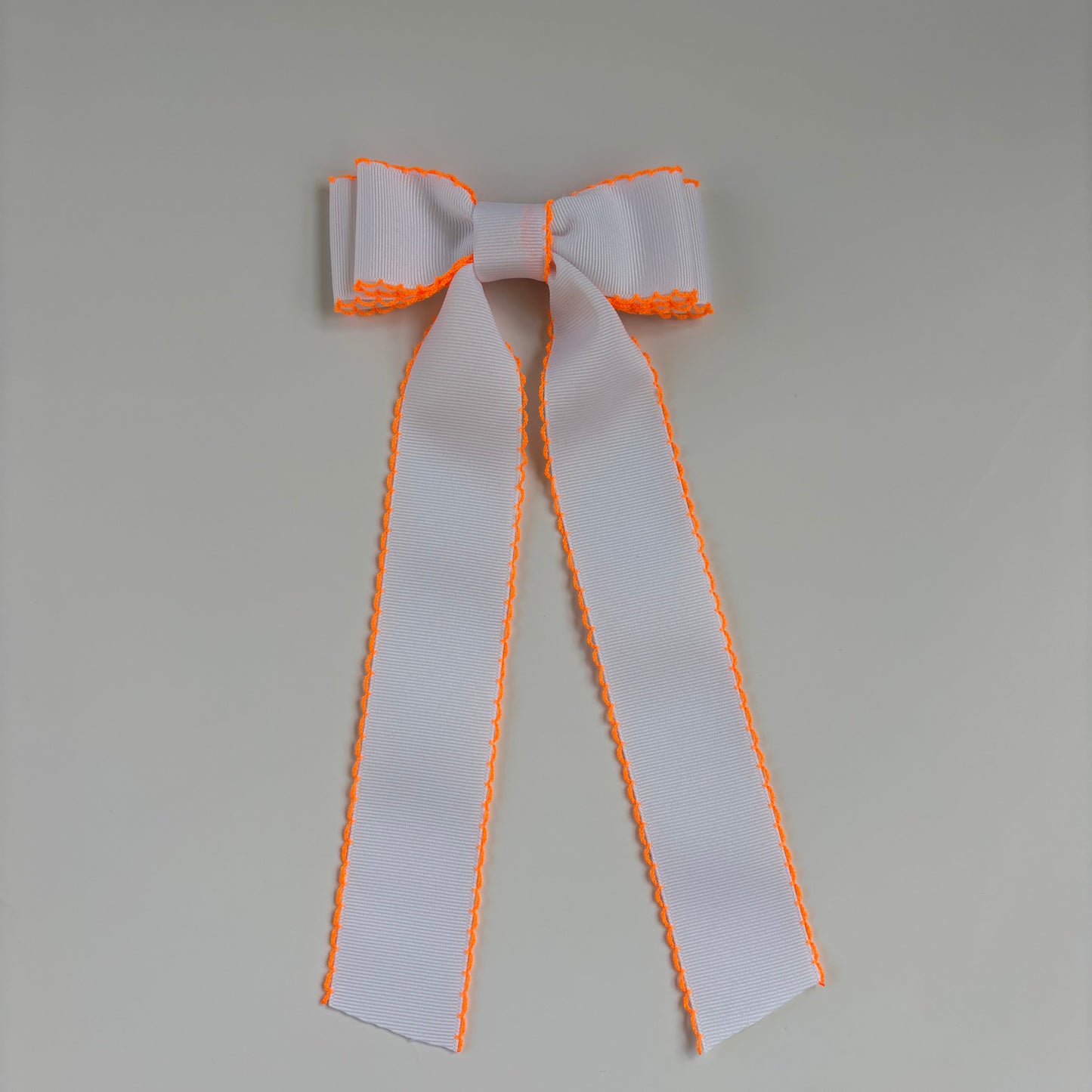 Moonstich White Neon Orange Bow