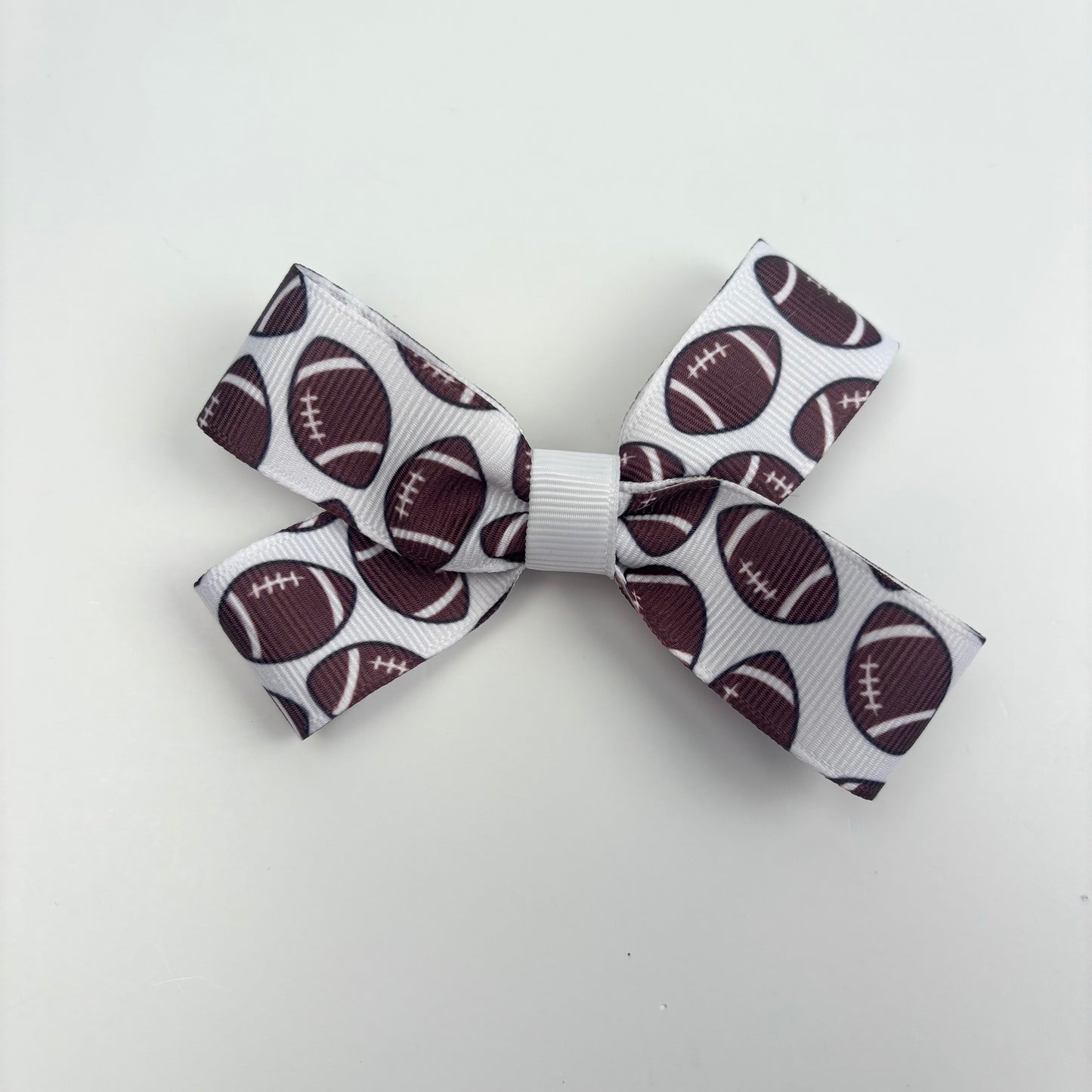 A Fall Collection Football Print Mini Bow