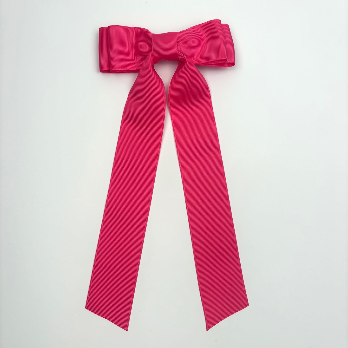A Grosgrain Bright Pink Bow