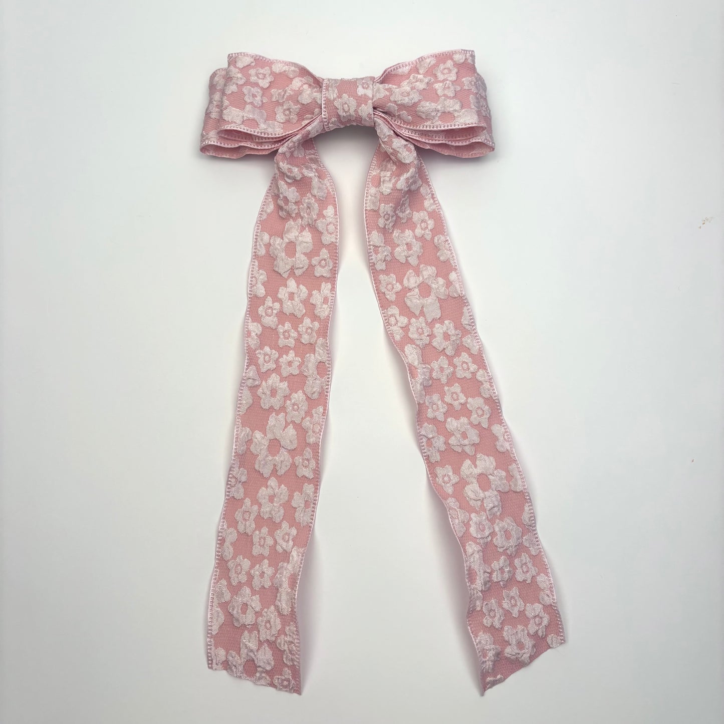 A Spring Embossed Floral Pink Bow