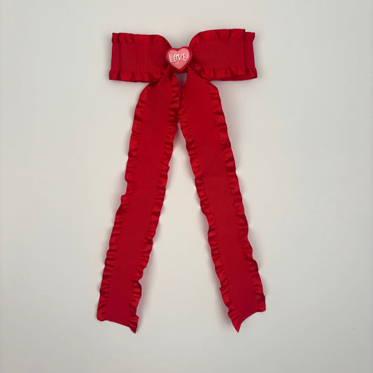 A Cupid Collection Ruffle Red Bow w/ Love Heart Embellishment