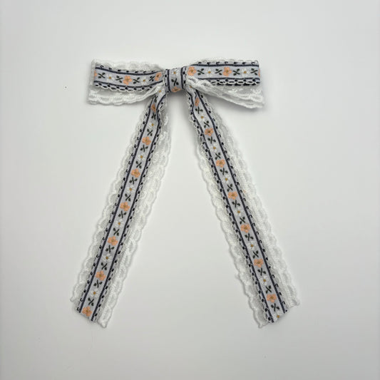A Siri Sister X HRL Collection Layered Lace Bow