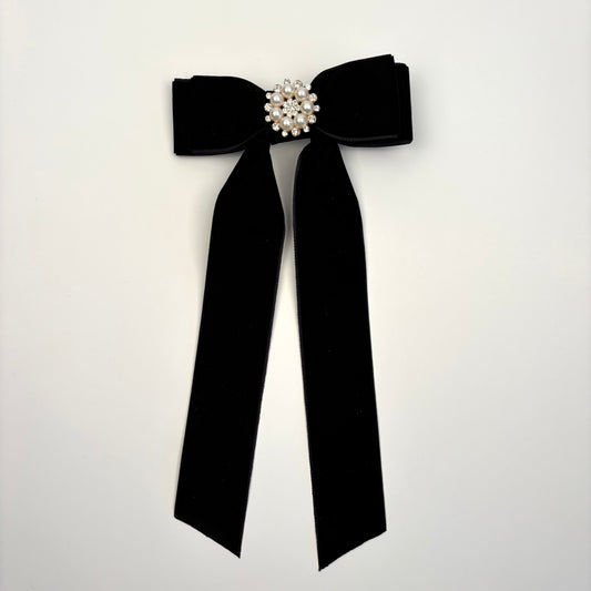 A Holiday Velvet Black Bow with Embellishment