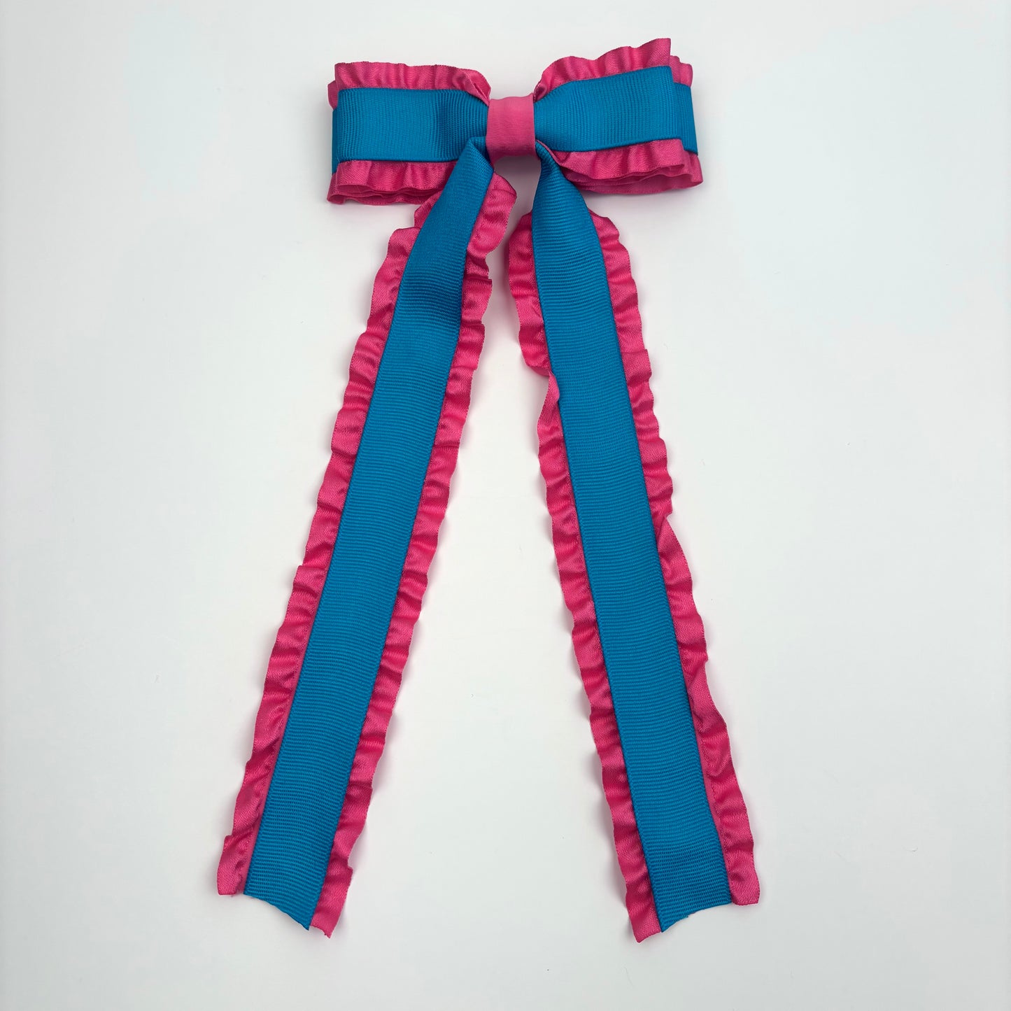 A Spring Pink and Turquoise Layered Bow